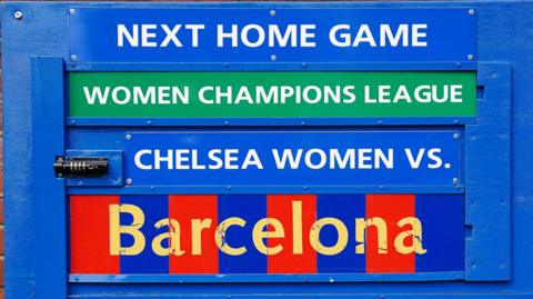 A board showing Chelsea's fixture details for their Champions League game against Barcelona
