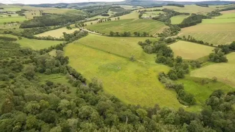 CampbellMac Developments An aerial view of agricultural land in the Scottish Borders