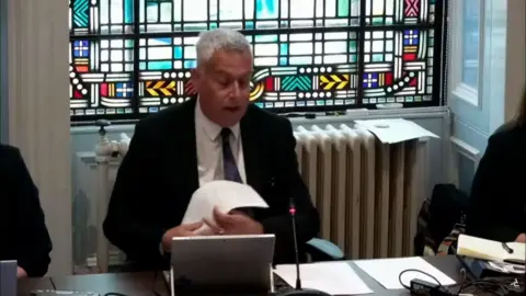 Footage from the meeting shows Brian Boyd interrupting independent councillor Lois Speed.