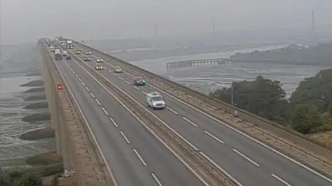 Highways Traffic Cameras/National Highways CCTV image of cars driving over Orwell Bridge 