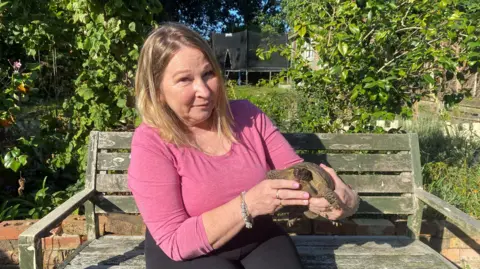 Wendy Krotochwil with Jack the tortoise