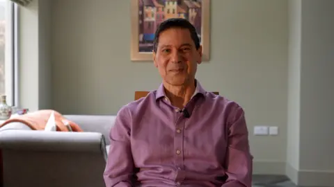 Vito Cilenti in his sitting room wearing a shirt