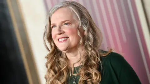 Getty Images Suzanne Collins at the premiere of "The Hunger Games: The Ballad of Songbirds & Snakes" held at TCL Chinese Theatre on November 13, 2023 in Los Angeles, California.