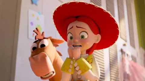 PA An image captured from the Toy Story 5 movie, showing Jessie and Bullseye with a horrified expression 