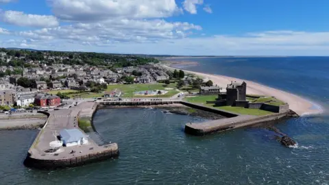 An aerial view of Broughty Ferry beach, including the historic Broughty Castle and a bay