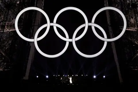 Ludovic Marin/AFP Canadian singer Celine Dion performs on the Eiffel Tower during the opening ceremony of the Paris 2024 Olympic Games in Paris on July 26, 2024.