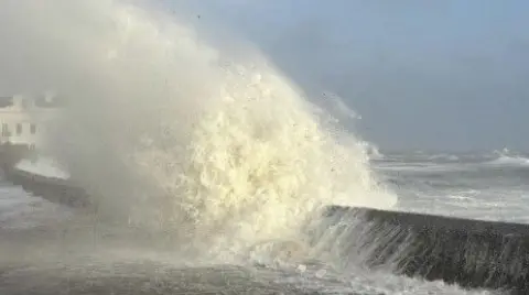 Waves breaking on Castletown Promenade