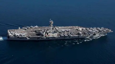 The USS Abraham Lincoln sailing in the sea