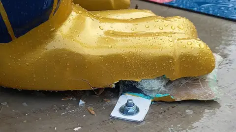 St Richard's Hospice Damage to penguin sculpture's foot