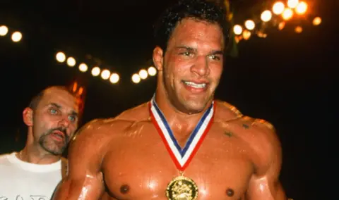 Getty Images Mark Kerr reacts after winning the heavyweight tournament during the UFC 14 event inside Boutwell Auditorium on July 27, 1997 in Birmingham, Alabama