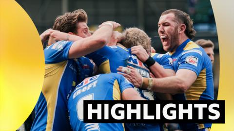 Leeds celebrate a try against Hull FC