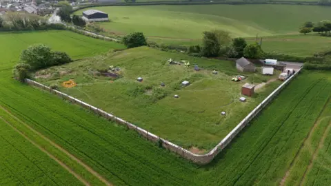 PA Media A drone view of Hill Head reservoir in Devon