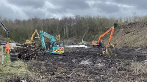 Work to fix a landslip near a railway line