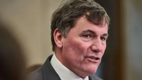 An image of Dominic LeBlanc mid speech. He is wearing a suit and has black and gray short hair. 