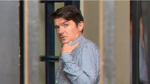 BBC Michael McMonagle looking sideways 