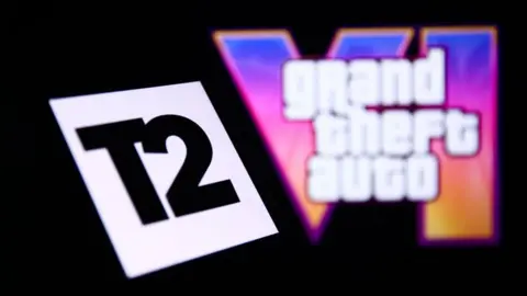 Getty Images Take-Two interactive logo displayed on a smartphone with Grand Theft Auto VI logo in the background
