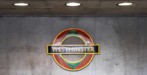 Alastair Fyfe Picture of Larry Achiampong's, Pan-African Flag for the Relic Travellers’ Alliance (Union), 2022, Westminster Underground station