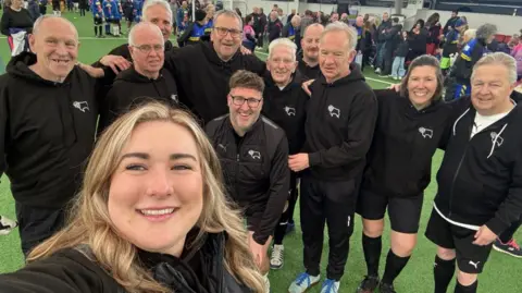Derby County Community Trust A selfie photo showing the team at a match event