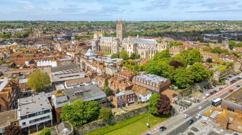 A drone shot of Canterbury, with the Cathedral in the centre of the shot.