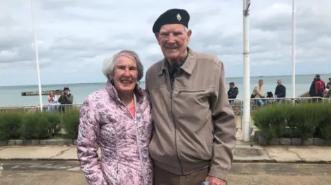 PA Media Albert Price and his wife Betty in Normandy in 2019