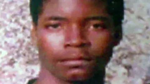 A grainy close-up image of Guide Nyachuru as a teenager