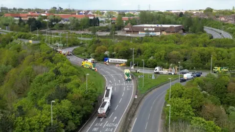 Copdock crash - drone image showing overturned tanker on the roundabout