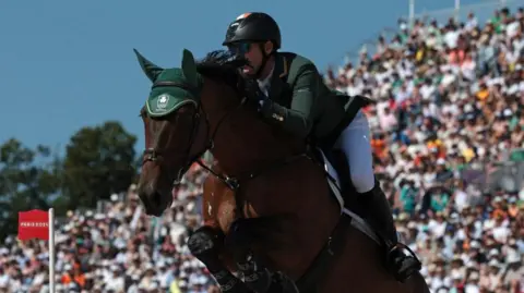 Reuters Daniel Coyle and his horse Legacy pictured at the Olympics in Paris 