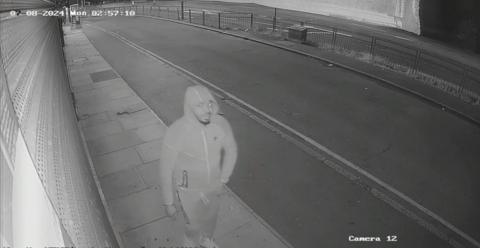 CCTV image of black man walking 