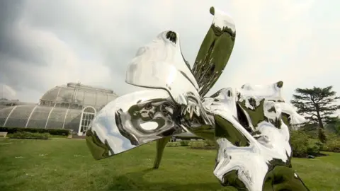 A giant mirrored sculpture at Kew Gardens