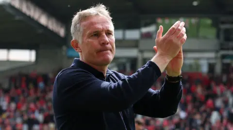 Phil Parkinson applauds Wrexham supporters