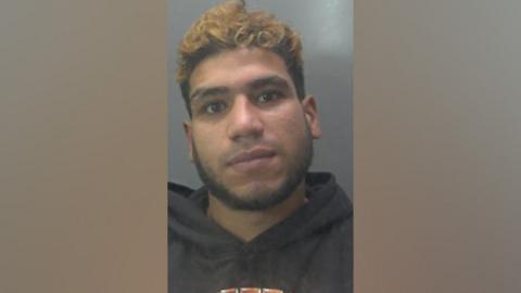 Police photo of Ahmed Hassan