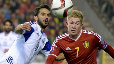 Israel's Kahat Roi and Belgium's Kevin de Bruyne chase the ball during a Euro 2016 qualifier in October 2015