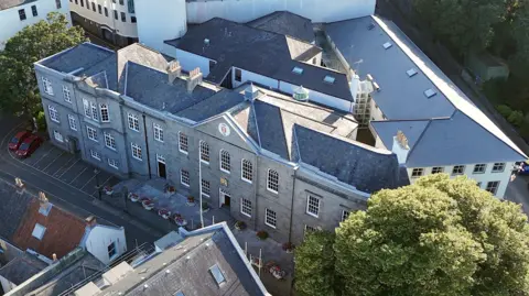 A large government building pictured from above.