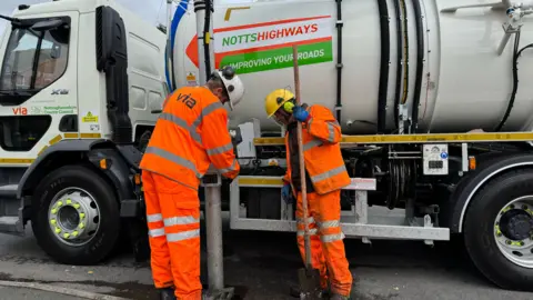 BBC Maintenance crew flush out blocked drain