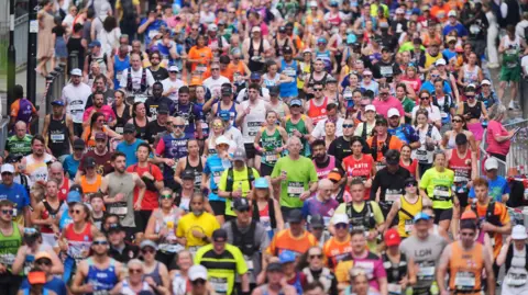 Yui Monk/PA Wire An aerial view of runners taking part in the London Marathon on 27/04/25.