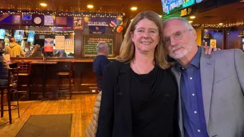 Sandra Symon and Tim Omara