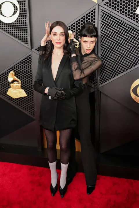 Getty Images St. Vincent posing with Charlotte Kemp Muhlattend