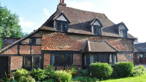 Exterior shot of 15th Century Cranleigh Cottage Hospital