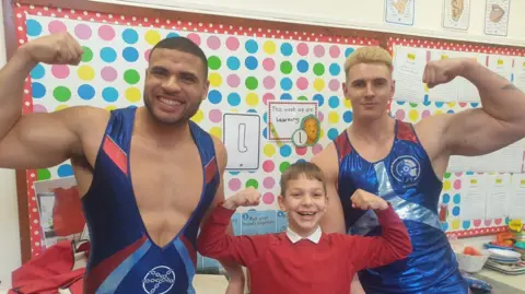 St Gregory Primary School Two Gladiators with a pupil 