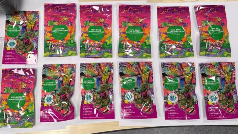 Government of Jersey Class A chocolate sweets shaped like dinosaurs