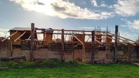 Forest of Dean District Council The half built building - the building has no roof
