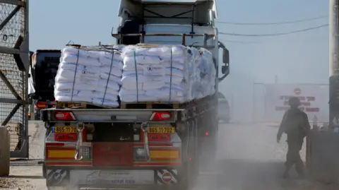 File photo showing a lorry carrying UN food aid entering the Gaza Strip via the Israeli-controlled Kerem Shalom crossing, in southern Israel (11 November 2024)