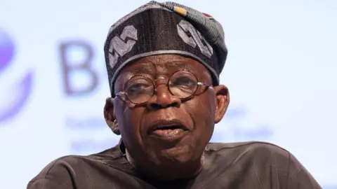 A close up image of Bola Tinubu