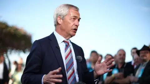 EPA Nigel Farage speaks to a crrowd of supporters