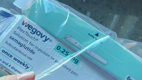 Wegovy medication shown packaged up in a plastic bag.
