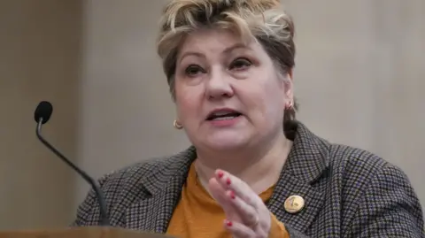 PA Media Dame Emily Thornberry speaks into a microphone.