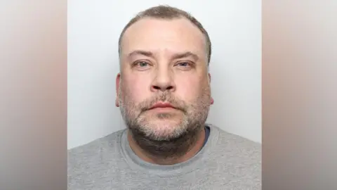 Mugshot of Stuart Hartley