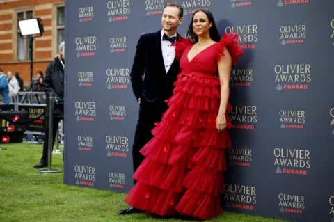 EPA English actor Tom Hiddleston (L) and English actor Zawe Ashton pose on the green carpet for the Olivier Awards 2026 at the Royal Albert Hall in London, Britain, 12 April 2026