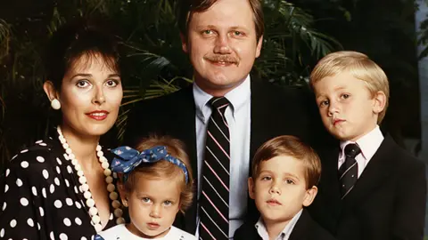 PA Media Victoria and John Cummock with her family