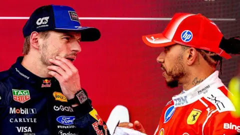 Red Bull's Max Verstappen and Ferrari's Lewis Hamilton in discussions at the Canadian Grand Prix